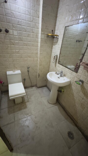 Bathroom in 3 BHK Builder Floor at Palm Residency Chhatarpur, Chattarpur – for Rent