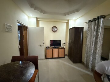 Living Room in 1 BHK Apartment at Sapphire Lakeside, Powai – for Rent