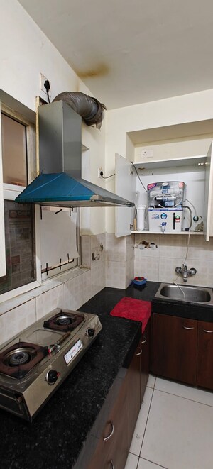 Kitchen in 3 BHK Apartment at Windlass River Valley, Harrawala – for Sale