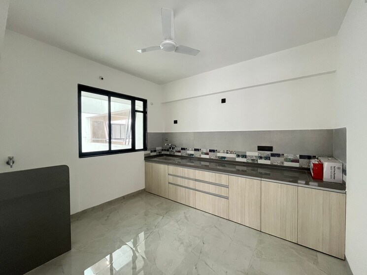 Kitchen, unique-youtopia 3 Bedroom 1009 Sq.Ft. Apartment In Kharadi Pune 9015825