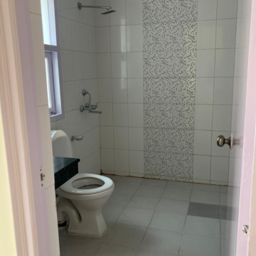 Bathroom in 3 BHK Apartment at Shiv Sai Ozone Park, Sector 86 – for Rent
