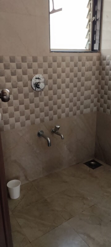 Bathroom in 1 BHK Apartment at Cosmos Orchid, Ghodbunder Road – for Sale