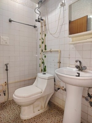 Bathroom in 3 BHK Apartment at RWA Jasola Sector 7, Jasola – for Sale