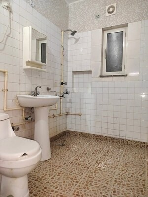 Bathroom in 3 BHK Apartment at RWA Jasola Sector 7, Jasola – for Sale