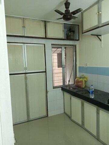 Kitchen in 1 RK Apartment at Adarsh CHS Vasant Vihar, Vasant Vihar – for Sale
