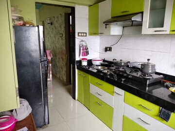 Kitchen in 2 BHK Apartment at Prestige Residency Pinewood, Ghodbunder Road – for Sale
