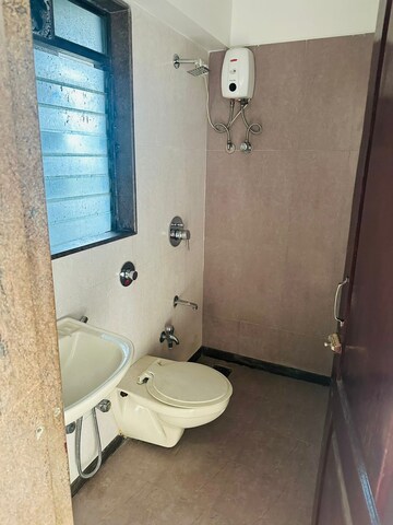 Bathroom in 2 BHK Apartment at Skyrise Apartments, Chembur – for Rent