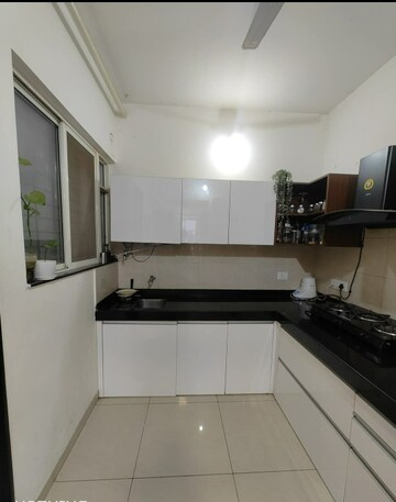 Kitchen in 3 BHK Apartment at Nirman Adi, Kalyani Nagar – for Rent