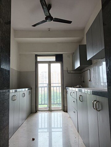 Kitchen in 2.5 BHK Apartment at Arjun CHS Vasant Vihar, Vasant Vihar – for Sale