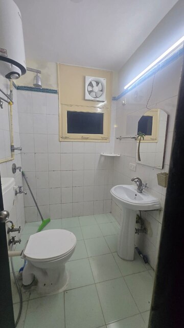 Bathroom in 4 BHK Apartment at Tarika CGHS, Sector 43 – for Rent