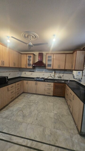 Kitchen in 4 BHK Apartment at Tarika CGHS, Sector 43 – for Rent
