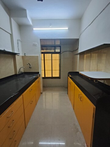 Kitchen in 2 BHK Apartment at Group Seven Rushi Heights, Goregaon East – for Sale