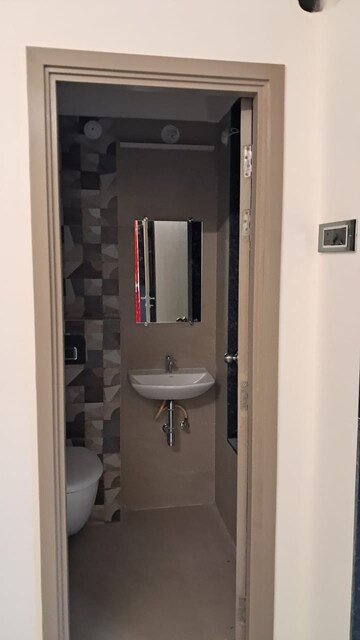 Bathroom in 1.5 BHK Apartment at Ajmera Greenfinity, Wadala East – for Rent