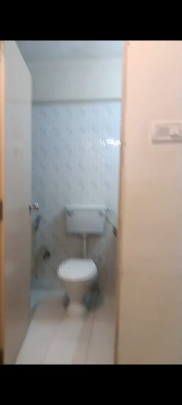 Bathroom in 2 BHK Apartment at Crystal Garden Estate CHS, Manpada – for Sale