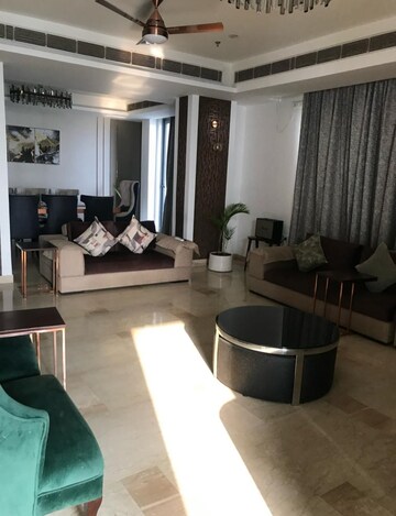 Living Room in 4 BHK Apartment at Supertech Supernova Nova Residences, Sector 94 – for Rent