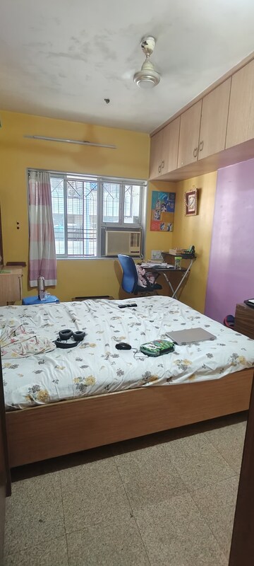 Bedroom in 2 BHK Apartment at Dheeraj Uphar CHS. LTD., Malad East – for Rent