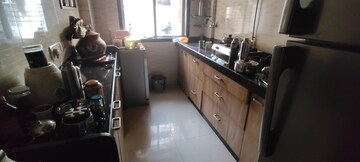 Kitchen in 2 BHK Apartment at Dheeraj Uphar CHS. LTD., Malad East – for Rent