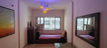 Bedroom in 2 BHK Apartment at Dheeraj Uphar CHS. LTD., Malad East – for Rent