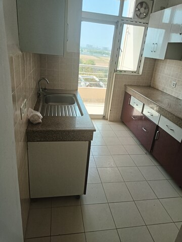 Kitchen in 3 BHK Apartment at Ansal Highland Park, Sector 103 – for Rent