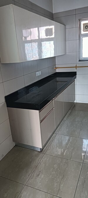 Kitchen in 3 BHK Apartment at Adani M2K Oyster Grande, Sector 102 – for Sale