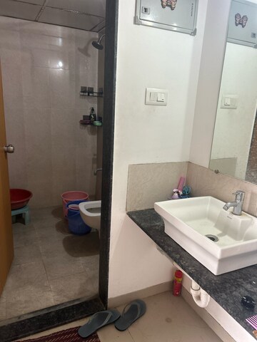 Bathroom in 1 BHK Apartment at Saarrthi Savvy Homes, Bhagwan Nagar – for Rent