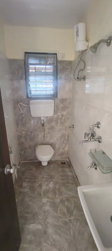 Bathroom in 1 BHK Apartment at Rosa Classique, Kasarvadavali – for Rent