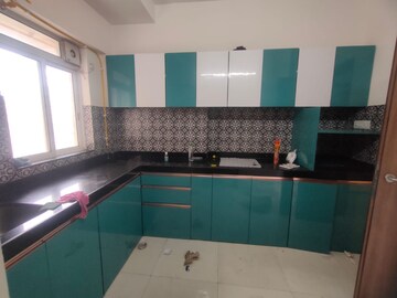 Kitchen in 2 BHK Apartment at Raymond Ten X Habitat, Swastik Garden – for Rent