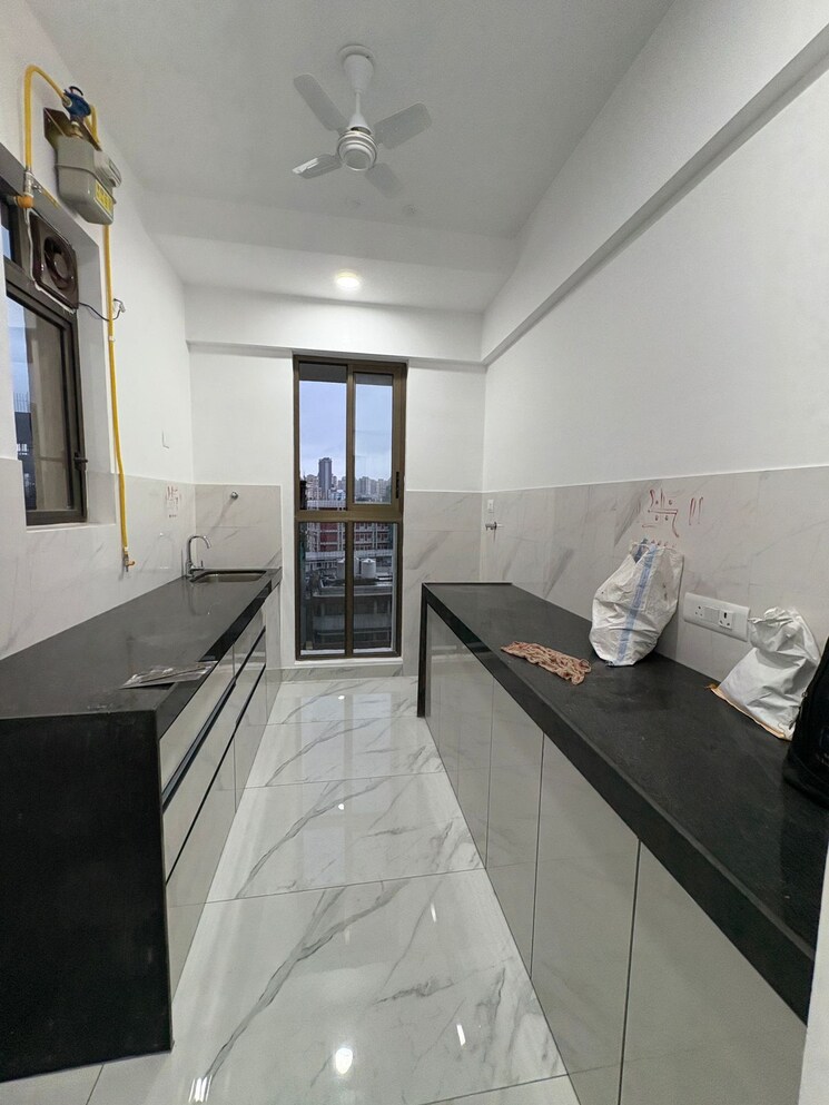 Kitchen, raymond-ten-x-habitat 2 Bedroom 595 Sq.Ft. Apartment In Pokhran Road No Two Thane 9017196