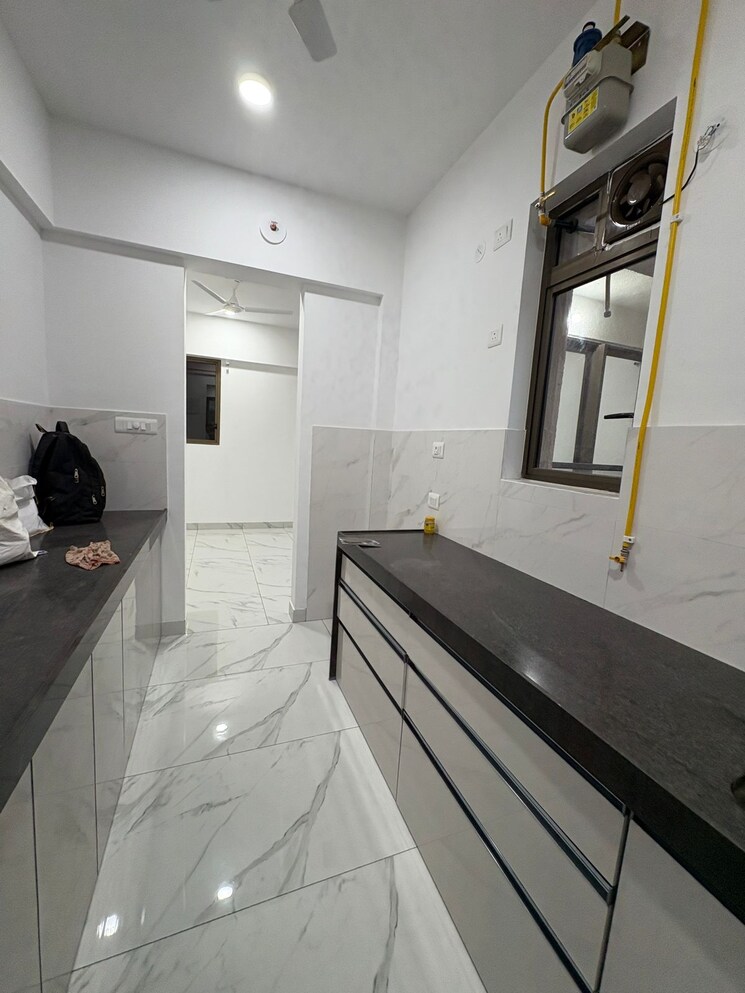 Kitchen, raymond-ten-x-habitat 2 Bedroom 595 Sq.Ft. Apartment In Pokhran Road No Two Thane 9017196