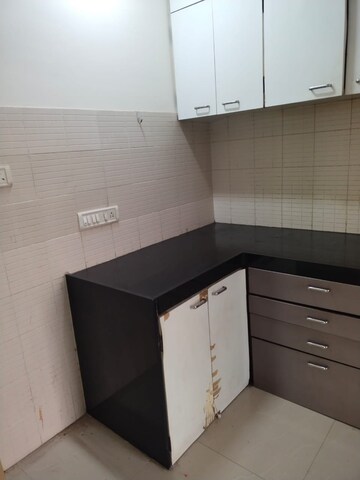 Kitchen in 1 BHK Apartment at Rutu Enclave, Kasarvadavali – for Sale
