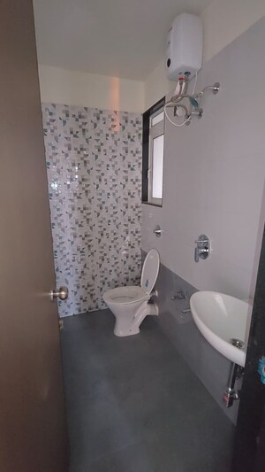 Bathroom in 1 BHK Apartment at Vihang Valley Phase 2, Kasarvadavali – for Sale
