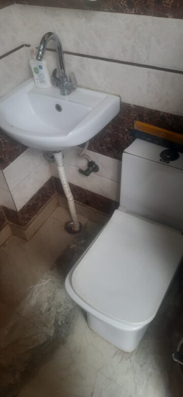 Bathroom in 2 BHK Builder Floor at Om Vihar – for Sale