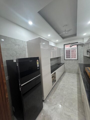 Kitchen in 3 BHK Apartment at DLF Atria, Dlf Phase ii – for Rent