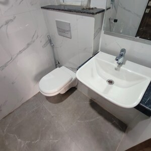 Bathroom in 3 BHK Apartment at Shapoorji Pallonji Joyville Tower Crown, Sector 102 – for Sale