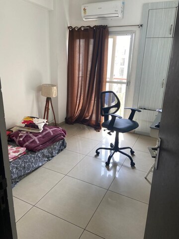 Living Room in 2 BHK Apartment at Logix Blossom Zest, Sector 143 – for Rent