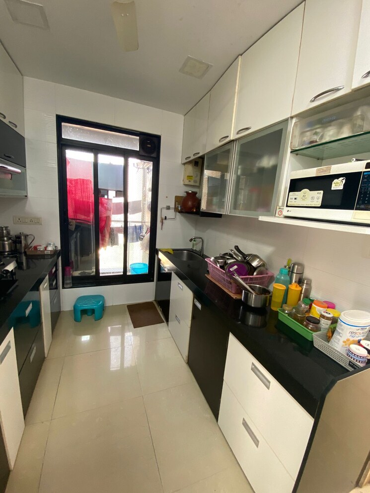 Kitchen, rustomjee-elanza 2 Bedroom 825 Sq.Ft. Apartment In Malad West Mumbai 9017654