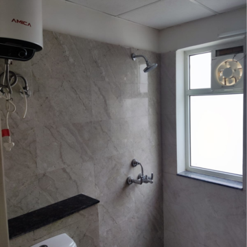 Bathroom in 3 BHK Apartment at International Airport Road – for Rent