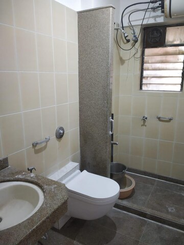 Bathroom in 3 BHK Apartment at Abrol Vastu Park, Malad West – for Rent