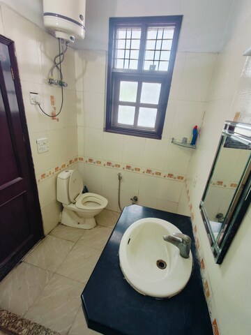 Bathroom in 3 BHK Builder Floor at Sushant Vyapaar Kendra, Sector 43 – for Rent