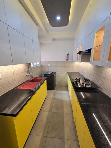 Kitchen in 3 BHK Apartment at Bhartiya City Nikoo Homes 6, Kogilu – for Rent