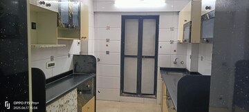 Kitchen in 2 BHK Apartment at Wadhwa Meadows, Khadakpada – for Rent