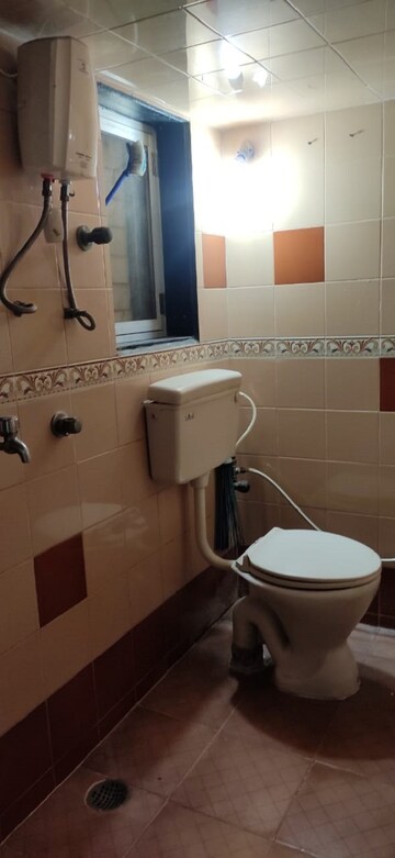 Bathroom in 2 BHK Apartment at Kalyan West – for Sale