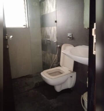 Bathroom in 2 BHK Apartment at Kanakia Spaces Niharika, Manpada – for Rent