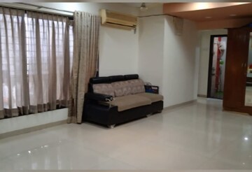 Living Room in 2 BHK Apartment at Kanakia Spaces Niharika, Manpada – for Rent
