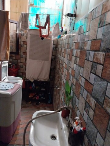 Bathroom in 3 BHK Apartment at Golf Gardenia, Alpha Ii Greater Noida – for Sale