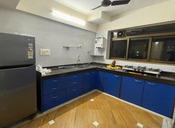 Kitchen in 2 BHK Apartment at Jasmine Tower, Vasant Vihar – for Rent