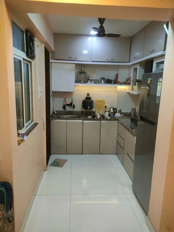 Kitchen in 2 BHK Apartment at KFP Chesterfield, Dhanori – for Rent