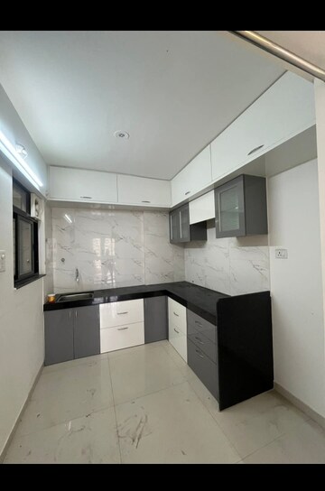 Kitchen in 2 BHK Apartment at Kohinoor Viva City, Dhanori – for Rent