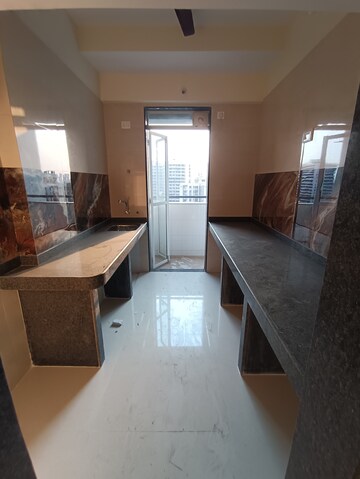 Kitchen in 1 BHK Apartment at Yogi Ajmera Bliss, Kalyan West – for Sale