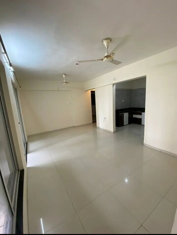 Room in 2 BHK Apartment at Gini Belvista Phase 1, Dhanori – for Rent